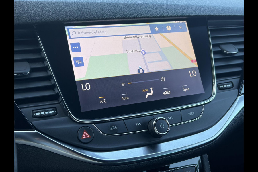 Opel Astra Sports Tourer 1.2 Ultimate 2e Eigenaar l Trekhaak l Camera l Carplay l Navi l Alcantara-Leder l 17''Lmv l Stoelverw-Stuurverw l Net beurt gehad l Dodehoek l Rijstrooksensor l Pdc V+A l 6 Bak l N.A.P l 146pk l Bj 11-2020 l Apk tot 08-2028