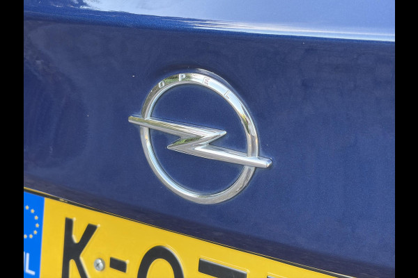 Opel Astra Sports Tourer 1.2 Ultimate 2e Eigenaar l Trekhaak l Camera l Carplay l Navi l Alcantara-Leder l 17''Lmv l Stoelverw-Stuurverw l Net beurt gehad l Dodehoek l Rijstrooksensor l Pdc V+A l 6 Bak l N.A.P l 146pk l Bj 11-2020 l Apk tot 08-2028