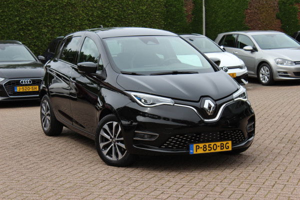 Renault ZOE R135 Intens 52 kWh / SoH 89,5% / Snelladen / Camera / CarPlay / Warmtepomp / Keyless / 16'' / Half leder / Dodehoek / Stuur+Stoelverwarming / DAB / Cruise Control