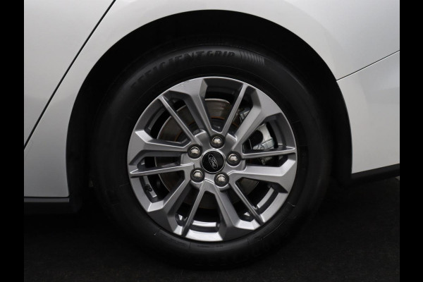 Ford Focus Wagon 1.0 EcoBoost Hybrid Titanium | Cruise control | Lane assist | Navigatie | Carplay | Park assist | Climate control