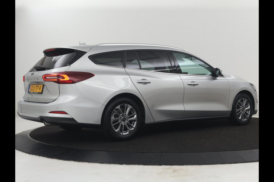 Ford Focus Wagon 1.0 EcoBoost Hybrid Titanium | Cruise control | Lane assist | Navigatie | Carplay | Park assist | Climate control