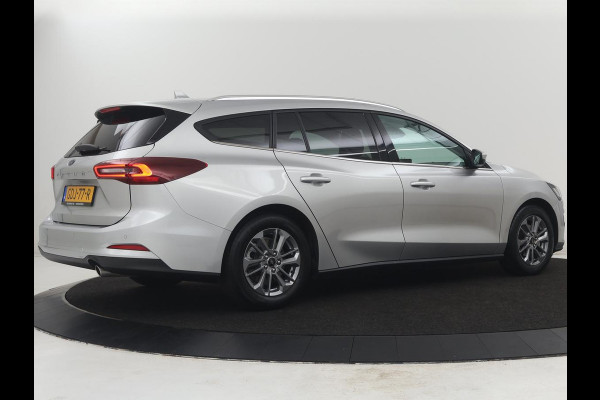 Ford Focus Wagon 1.0 EcoBoost Hybrid Titanium | Cruise control | Lane assist | Navigatie | Carplay | Park assist | Climate control