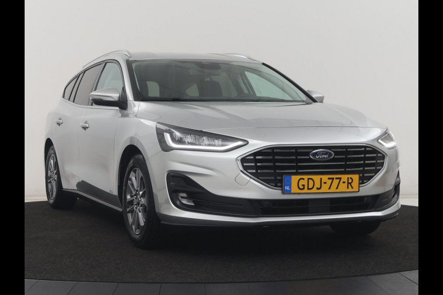 Ford Focus Wagon 1.0 EcoBoost Hybrid Titanium | Cruise control | Lane assist | Navigatie | Carplay | Park assist | Climate control