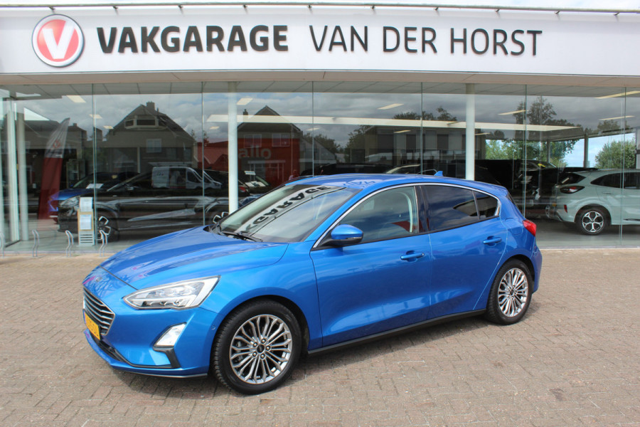 Ford Focus 1.0 EcoBoost Titanium Business , 125pk , Slects 65427km Climate control , Camera , Cruise control , Trekhaak , Luxe uitvoering Stoel,Stuur en Voorruitverwarming , Blind Spot ,