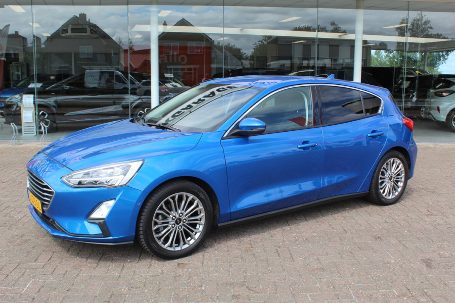 Ford Focus 1.0 EcoBoost Titanium Business , 125pk , Slects 65427km Climate control , Camera , Cruise control , Trekhaak , Luxe uitvoering Stoel,Stuur en Voorruitverwarming , Blind Spot ,