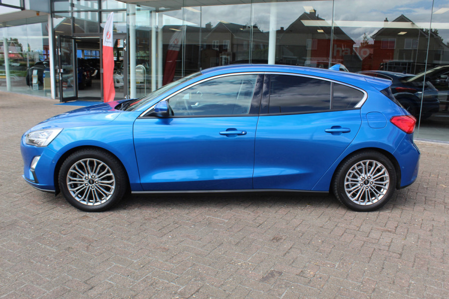 Ford Focus 1.0 EcoBoost Titanium Business , 125pk , Slects 65427km Climate control , Camera , Cruise control , Trekhaak , Luxe uitvoering Stoel,Stuur en Voorruitverwarming , Blind Spot ,