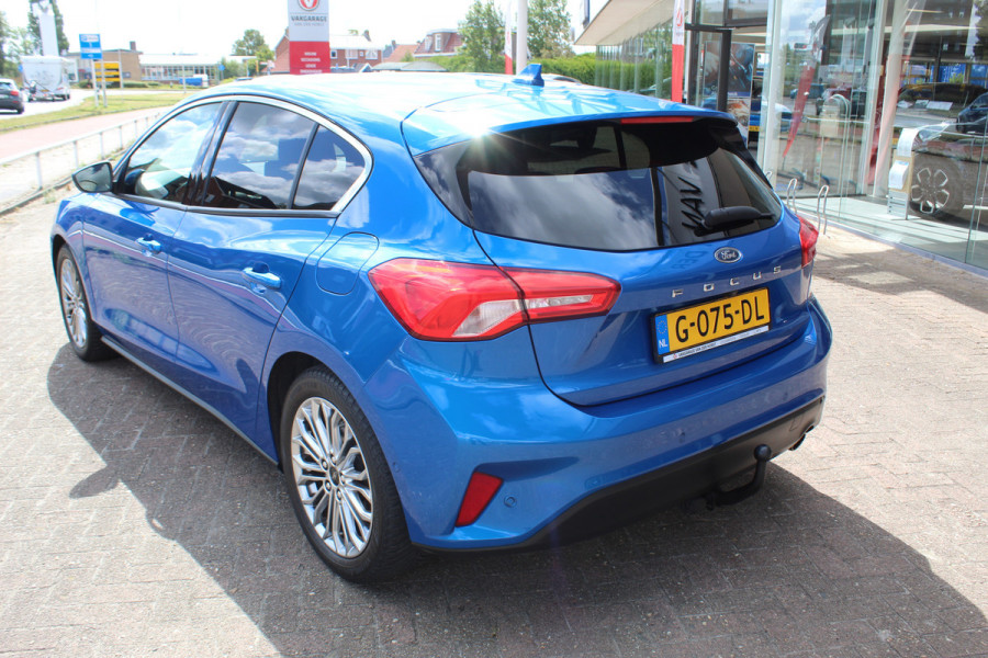 Ford Focus 1.0 EcoBoost Titanium Business , 125pk , Slects 65427km Climate control , Camera , Cruise control , Trekhaak , Luxe uitvoering Stoel,Stuur en Voorruitverwarming , Blind Spot ,