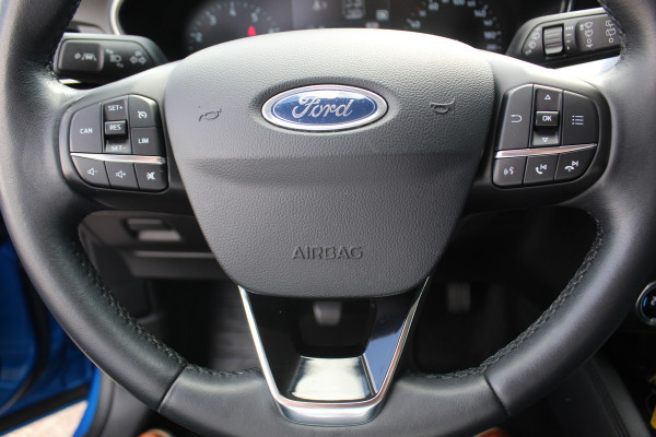 Ford Focus 1.0 EcoBoost Titanium Business , 125pk , Slects 65427km Climate control , Camera , Cruise control , Trekhaak , Luxe uitvoering Stoel,Stuur en Voorruitverwarming , Blind Spot ,