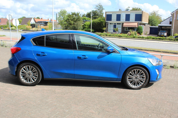 Ford Focus 1.0 EcoBoost Titanium Business , 125pk , Slects 65427km Climate control , Camera , Cruise control , Trekhaak , Luxe uitvoering Stoel,Stuur en Voorruitverwarming , Blind Spot ,