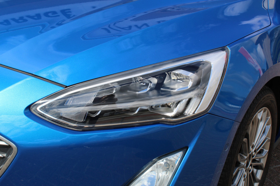 Ford Focus 1.0 EcoBoost Titanium Business , 125pk , Slects 65427km Climate control , Camera , Cruise control , Trekhaak , Luxe uitvoering Stoel,Stuur en Voorruitverwarming , Blind Spot ,