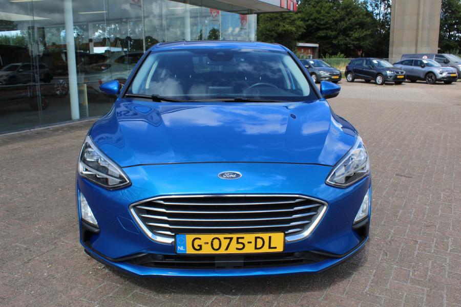 Ford Focus 1.0 EcoBoost Titanium Business , 125pk , Slects 65427km Climate control , Camera , Cruise control , Trekhaak , Luxe uitvoering Stoel,Stuur en Voorruitverwarming , Blind Spot ,