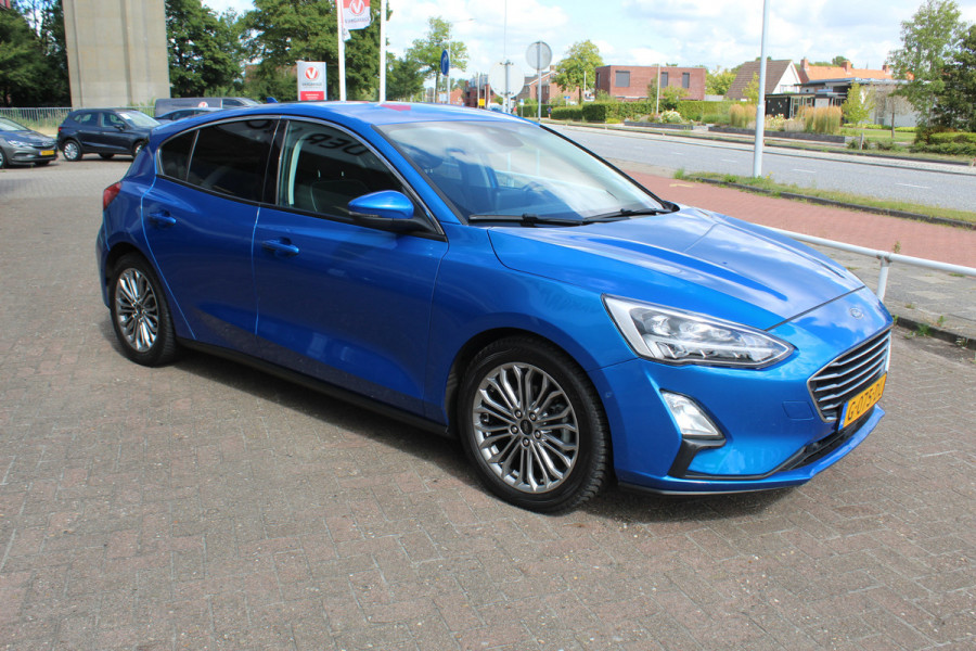 Ford Focus 1.0 EcoBoost Titanium Business , 125pk , Slects 65427km Climate control , Camera , Cruise control , Trekhaak , Luxe uitvoering Stoel,Stuur en Voorruitverwarming , Blind Spot ,