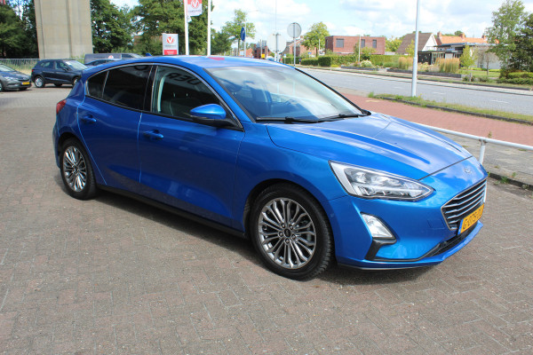 Ford Focus 1.0 EcoBoost Titanium Business , 125pk , Slects 65427km Climate control , Camera , Cruise control , Trekhaak , Luxe uitvoering Stoel,Stuur en Voorruitverwarming , Blind Spot ,