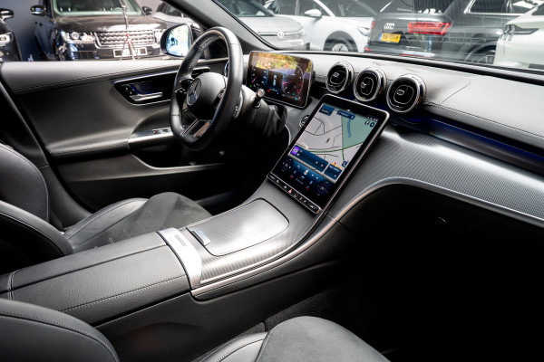 Mercedes-Benz C-Klasse Estate 180 AMG Line Leer Camera Navi LED Nightpack PTS Ambient Elekt. achterklep Elektr. trekhaak LM velgen BTW auto!