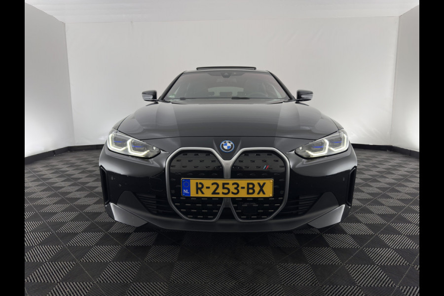 BMW i4 eDrive40 High Executive 84 kWh [3-Fase-11kW] {SoH-98%} (INCL.BTW) *PANO | HEAD-UP | LEATHER | LASER-LED | HARMAN/KARDON | HEATED-SPORTSEATS | WIDESCREEN-DIGI-COCKPIT | CAMERA | DAB+ | PRIVACY-GLASS | NAVI-FULLMAP | ECC | PDC | 18''ALU*