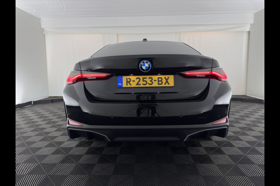 BMW i4 eDrive40 High Executive 84 kWh [3-Fase-11kW] {SoH-98%} (INCL.BTW) *PANO | HEAD-UP | LEATHER | LASER-LED | HARMAN/KARDON | HEATED-SPORTSEATS | WIDESCREEN-DIGI-COCKPIT | CAMERA | DAB+ | PRIVACY-GLASS | NAVI-FULLMAP | ECC | PDC | 18''ALU*
