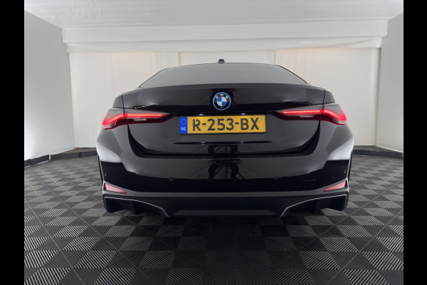 BMW i4 eDrive40 High Executive 84 kWh [3-Fase-11kW] {SoH-98%} (INCL.BTW) *PANO | HEAD-UP | LEATHER | LASER-LED | HARMAN/KARDON | HEATED-SPORTSEATS | WIDESCREEN-DIGI-COCKPIT | CAMERA | DAB+ | PRIVACY-GLASS | NAVI-FULLMAP | ECC | PDC | 18''ALU*