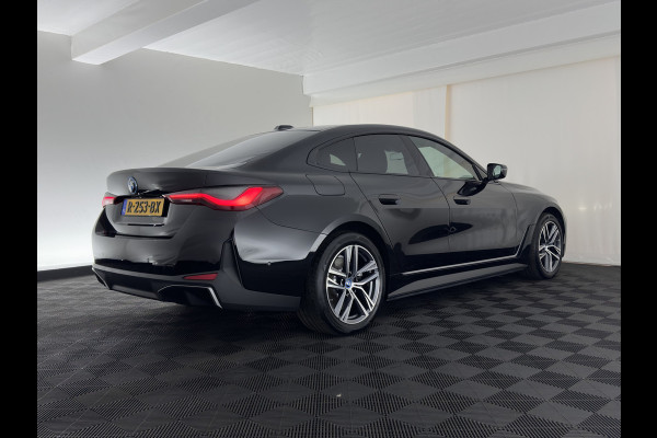BMW i4 eDrive40 High Executive 84 kWh [3-Fase-11kW] {SoH-98%} (INCL.BTW) *PANO | HEAD-UP | LEATHER | LASER-LED | HARMAN/KARDON | HEATED-SPORTSEATS | WIDESCREEN-DIGI-COCKPIT | CAMERA | DAB+ | PRIVACY-GLASS | NAVI-FULLMAP | ECC | PDC | 18''ALU*