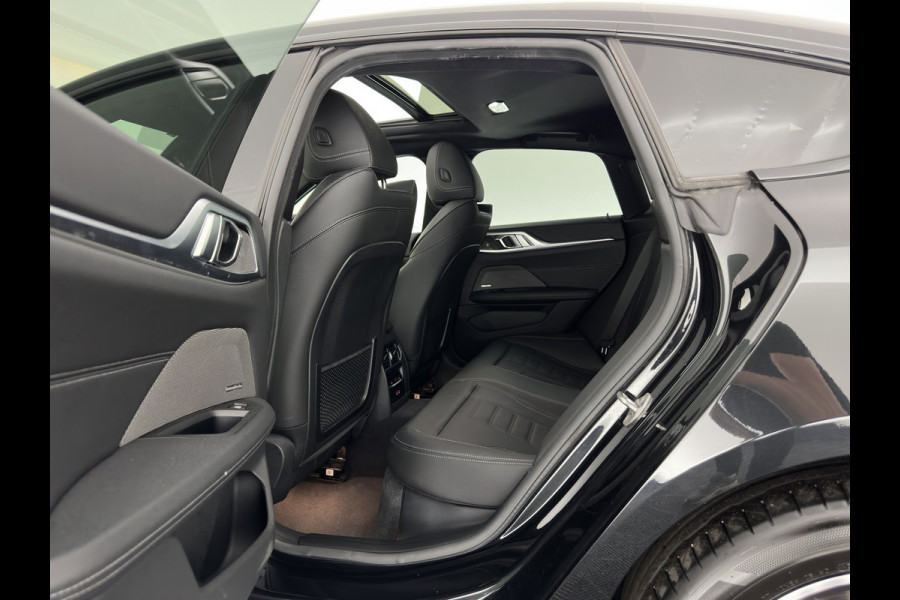 BMW i4 eDrive40 High Executive 84 kWh [3-Fase-11kW] {SoH-98%} (INCL.BTW) *PANO | HEAD-UP | LEATHER | LASER-LED | HARMAN/KARDON | HEATED-SPORTSEATS | WIDESCREEN-DIGI-COCKPIT | CAMERA | DAB+ | PRIVACY-GLASS | NAVI-FULLMAP | ECC | PDC | 18''ALU*