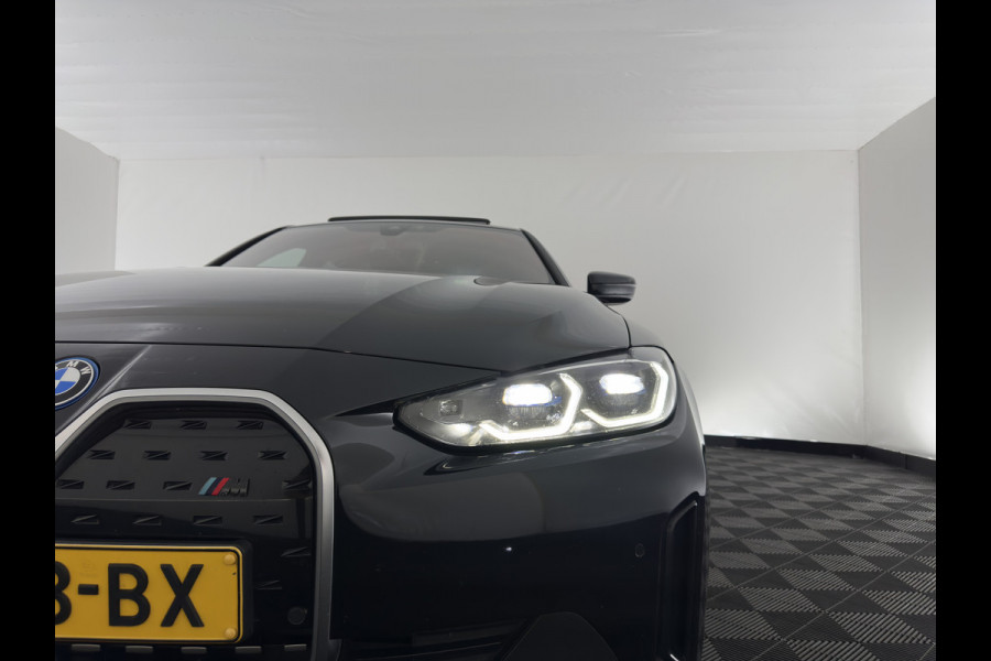 BMW i4 eDrive40 High Executive 84 kWh [3-Fase-11kW] {SoH-98%} (INCL.BTW) *PANO | HEAD-UP | LEATHER | LASER-LED | HARMAN/KARDON | HEATED-SPORTSEATS | WIDESCREEN-DIGI-COCKPIT | CAMERA | DAB+ | PRIVACY-GLASS | NAVI-FULLMAP | ECC | PDC | 18''ALU*