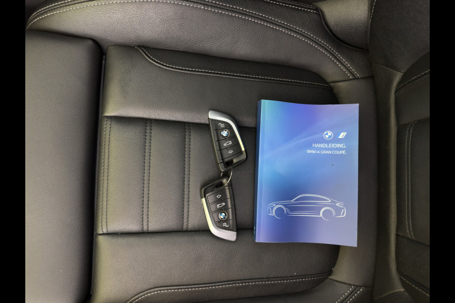 BMW i4 eDrive40 High Executive 84 kWh [3-Fase-11kW] {SoH-98%} (INCL.BTW) *PANO | HEAD-UP | LEATHER | LASER-LED | HARMAN/KARDON | HEATED-SPORTSEATS | WIDESCREEN-DIGI-COCKPIT | CAMERA | DAB+ | PRIVACY-GLASS | NAVI-FULLMAP | ECC | PDC | 18''ALU*