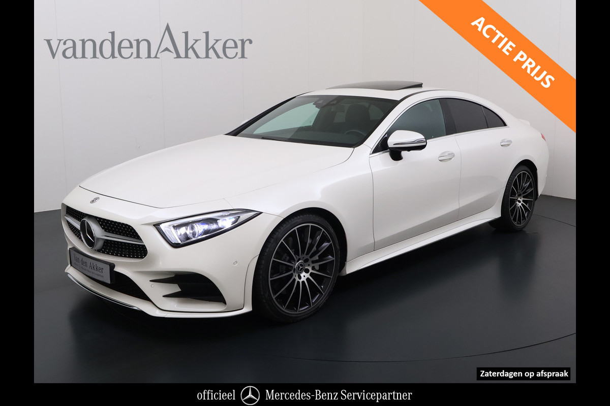 Mercedes-Benz CLS-Klasse 450 4Matic AMG // Burmester // 360 Camera // Dealer onderhouden // Sunroof // Trekhaak // 20 inch // Designo White // Distronic
