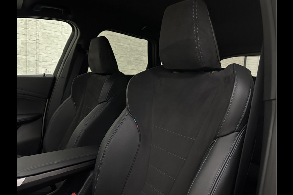 BMW iX1 30 313pk X-Drive M-Sport Performance | Adaptief Led | Sportstoelen | Keyless | 4WD | Adaptieve Cruise en Struurwielverw. voorbereid | Antraciet Hemel | Carplay | Sfeerverlichting | 1200kg Trekgewicht | Camera | Bovag Garantie.