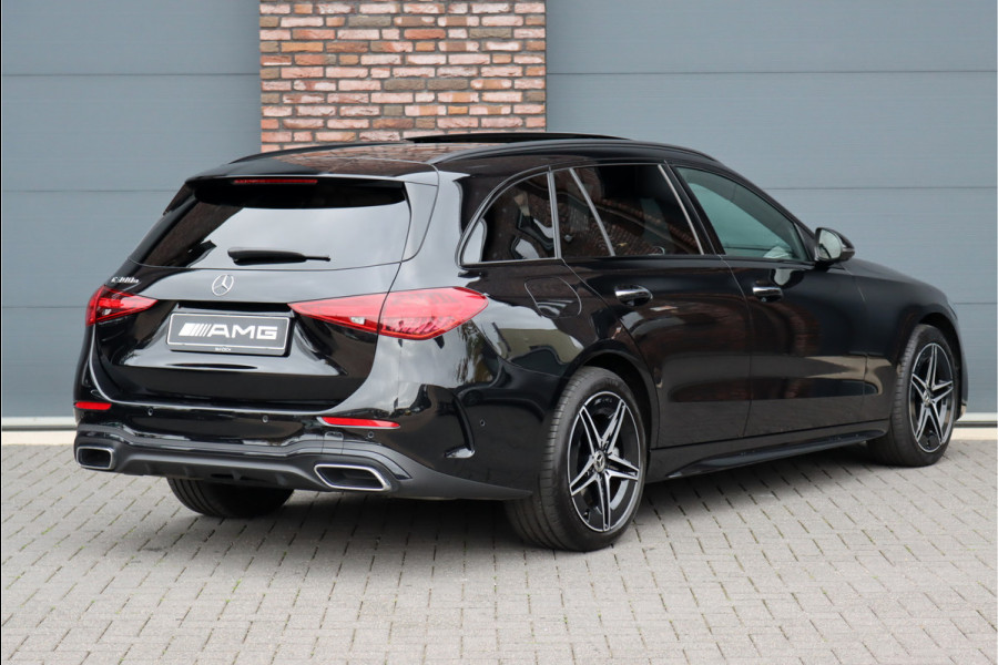 Mercedes-Benz C-Klasse Estate 300 e AMG Line | Distronic | Panoramadak | Memory | Surround Camera | Verwarmd Stuurwiel | Carplay | Sfeerverlichting Premium |
