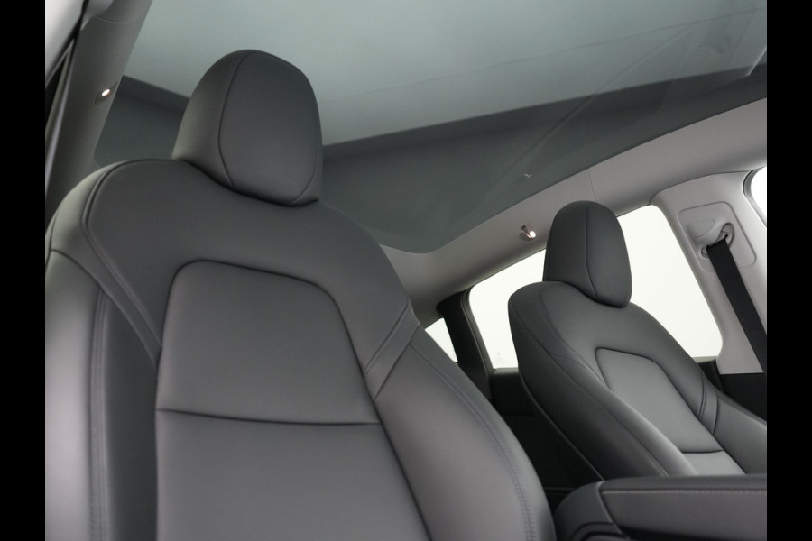 Tesla Model Y Long Range AWD 75 kWh 441pk | Full Self-Driving Capability | Panodak | Adaptive Cruise | Lederen Sportstoelen Memory & Verwarmd | Camera | Navigatie |