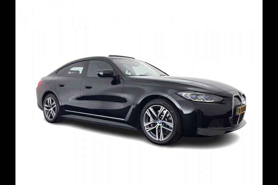 BMW i4 eDrive40 High Executive 84 kWh [3-Fase-11kW] {SoH-98%} (INCL.BTW) *PANO | HEAD-UP | LEATHER | LASER-LED | HARMAN/KARDON | HEATED-SPORTSEATS | WIDESCREEN-DIGI-COCKPIT | CAMERA | DAB+ | PRIVACY-GLASS | NAVI-FULLMAP | ECC | PDC | 18''ALU*