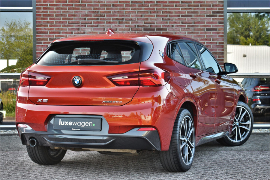 BMW X2 xDrive25e M-Sport | Pano | HUD | Sunset orange | 19 inch | Camera