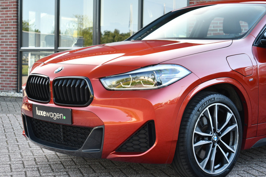 BMW X2 xDrive25e M-Sport | Pano | HUD | Sunset orange | 19 inch | Camera