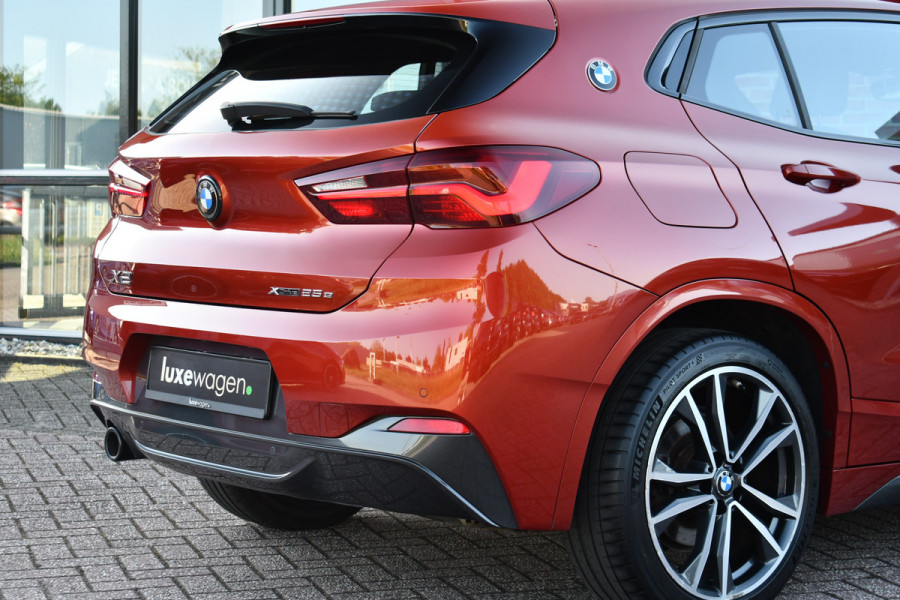 BMW X2 xDrive25e M-Sport | Pano | HUD | Sunset orange | 19 inch | Camera