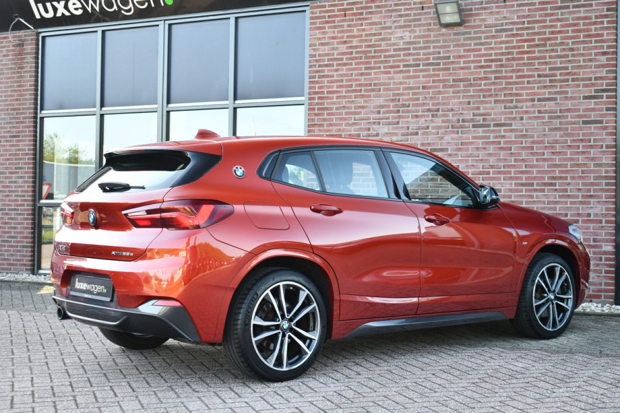 BMW X2 xDrive25e M-Sport | Pano | HUD | Sunset orange | 19 inch | Camera