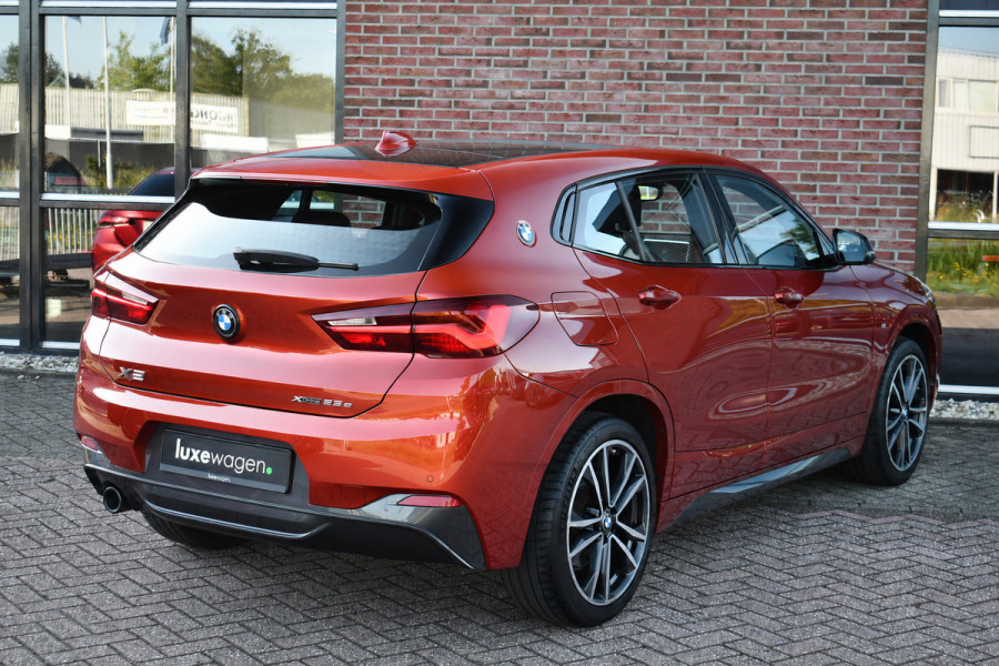 BMW X2 xDrive25e M-Sport | Pano | HUD | Sunset orange | 19 inch | Camera