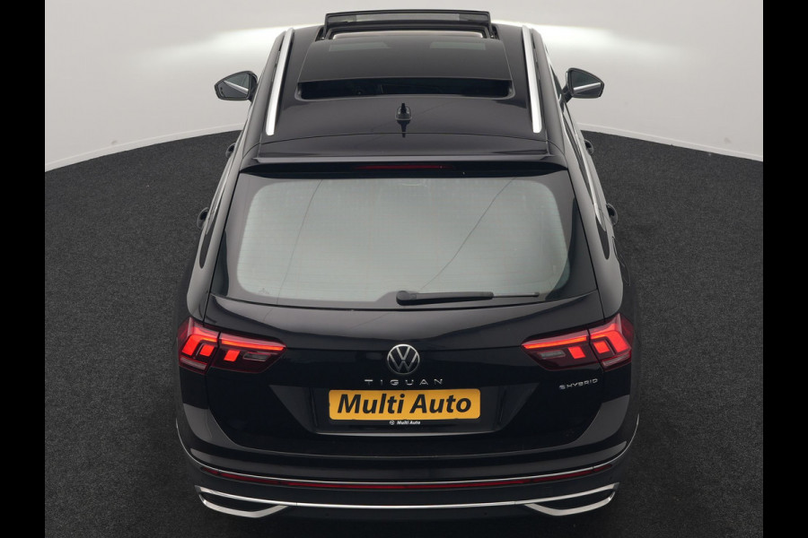 Volkswagen Tiguan 1.4 TSI eHybrid Elegance PHEV 245pk Dealer O.H | Trekhaak Af Fabriek | Panodak | Adaptive Cruise | IQ Light | 360 Camera | Lederen Sportstoelen Memory & Verwarmd | Travel Assist | Apple Carplay | Keyless | Stuurverwarming | BLIS | Virtual | Navigatie | DAB | 18"L.M | Plug In Hybrid |