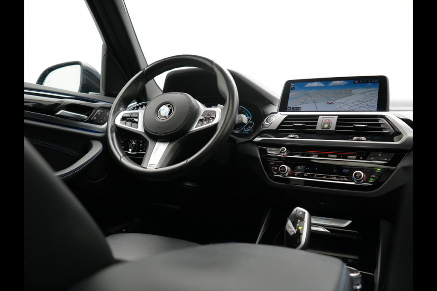BMW X3 xDrive30e M Sport PHEV 293pk | Trekhaak Afn. | Panodak | Head Up | Camera | Lederen Sportstoelen Memory & Verwarmd | Adaptive LED | Sfeerverlichting | Blis | Keyless | Navigatie | 19"L.M | Plug In Hybrid |