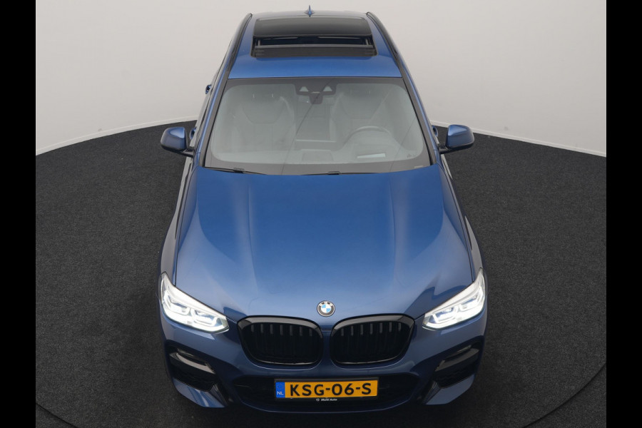 BMW X3 xDrive30e M Sport PHEV 293pk | Trekhaak Afn. | Panodak | Head Up | Camera | Lederen Sportstoelen Memory & Verwarmd | Adaptive LED | Sfeerverlichting | Blis | Keyless | Navigatie | 19"L.M | Plug In Hybrid |