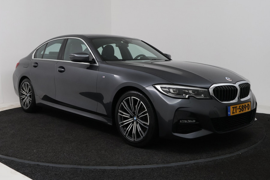 BMW 3-serie 320i High Executive Edition (STOELVERWARMING, CAMERA, PDC, SFEERVERLICHTING, TREKHAAK AFNE