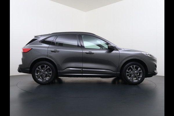 Ford Kuga 2.5 PHEV Hybrid ST-Line Adap.Cruise Stoel+Stuur+Voorruit+Achterbankverwarming Head-Up Display Camera Navi Elek.Achterklep Apple  Digital Cockpit Lane Assist Privacy Glas Lmv Pdc Led Bluetooth Isofix DAB Keyless