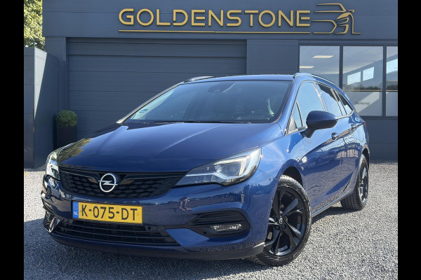 Opel Astra Sports Tourer 1.2 Ultimate 2e Eigenaar l Trekhaak l Camera l Carplay l Navi l Alcantara-Leder l 17''Lmv l Stoelverw-Stuurverw l Net beurt gehad l Dodehoek l Rijstrooksensor l Pdc V+A l 6 Bak l N.A.P l 146pk l Bj 11-2020 l Apk tot 08-2028