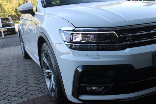 Volkswagen Tiguan 1.5 TSI 150PK AUTOMAAT HIGHLINE BUSINESS R | PANORAMA SCHUIF/KANTEL DAK | LEDEREN BEKLEDING | BESTUUDERSSTOEL ELEKTRISCH VERSTELBAAR MET GEHEUGENFUNCTIE | ELEKTRISCH WEGKLAPBARE TREKHAAK | IQ LIGHT KOPLAMPEN | VIRTUAL DISPLAY | DRAADLOZE APPLE CARPLAY/ANDROID AUTO | NAVIGATIE | 19" LICHTMETALEN VELGEN | ELEKTRISCH BEDIENBARE ACHTERKLEP | GETINTE ACHTERRUITEN | CAMERA VOOR + ACHTER | PARKEERSENSOREN VOOR + ACHTER | STOEL VERWARMING |