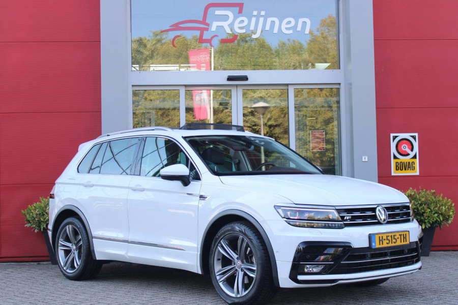 Volkswagen Tiguan 1.5 TSI 150PK AUTOMAAT HIGHLINE BUSINESS R | PANORAMA SCHUIF/KANTEL DAK | LEDEREN BEKLEDING | BESTUUDERSSTOEL ELEKTRISCH VERSTELBAAR MET GEHEUGENFUNCTIE | ELEKTRISCH WEGKLAPBARE TREKHAAK | IQ LIGHT KOPLAMPEN | VIRTUAL DISPLAY | DRAADLOZE APPLE CARPLAY/ANDROID AUTO | NAVIGATIE | 19" LICHTMETALEN VELGEN | ELEKTRISCH BEDIENBARE ACHTERKLEP | GETINTE ACHTERRUITEN | CAMERA VOOR + ACHTER | PARKEERSENSOREN VOOR + ACHTER | STOEL VERWARMING |