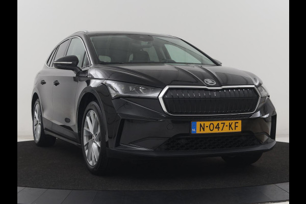 Škoda Enyaq iV 60 | SOH 92,0% | Half leder | Stuur/stoel verwarming | Adaptive cruise | Carplay | Sfeerverlichting | Climate control | Camera | Park assist | Trekhaak
