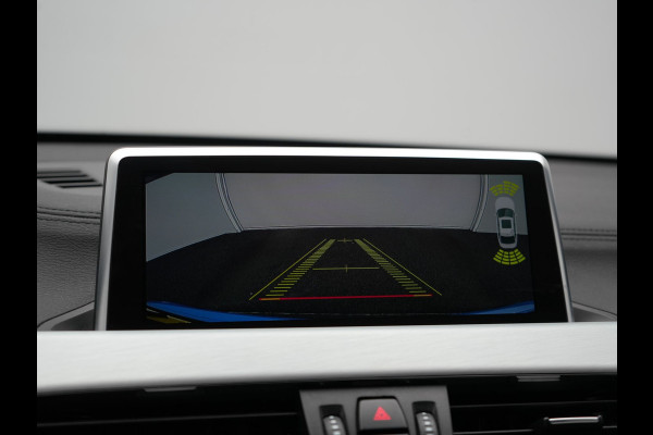 BMW X1 sDrive20i M Sport 192pk Misano Blauw Metallic | Trekhaak Afn. | Sportstoelen Verwarmd | Navi Pro | Sfeerverlichting | Apple Carplay | Camera | LED Koplampen | 18"L.M | M Sportstuur | Cruise Control |