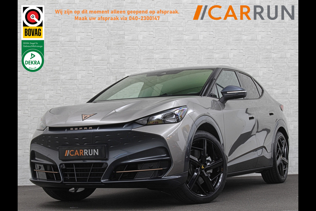 CUPRA Tavascan 286pk 77 kWh | Nieuw! | Winter-Pack | Warmtepomp | Verlengde Fabrieksgarantie | 7x Op Voorraad | Adaptive Cruise Control | 3-Zone Clima | Verwarmde Voorruit | Keyless-Entry | Sfeerverlichting | Stoelverwarming | Carplay | Stuurverwarming | Getint Glas | 19 inch | Lane-Assist | Camera | Draadloos Laden |