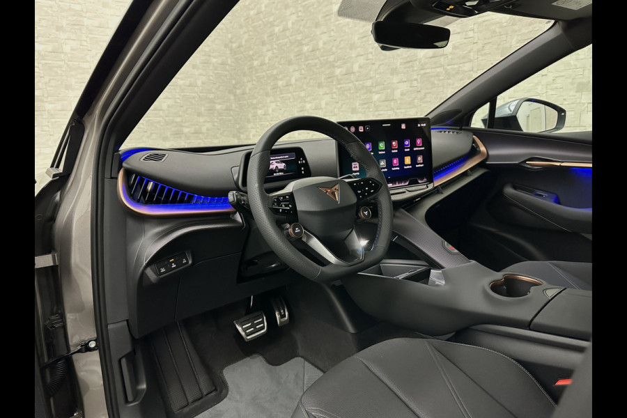 CUPRA Tavascan 286pk 77 kWh | Nieuw! | Winter-Pack | Warmtepomp | Verlengde Fabrieksgarantie | 7x Op Voorraad | Adaptive Cruise Control | 3-Zone Clima | Verwarmde Voorruit | Keyless-Entry | Sfeerverlichting | Stoelverwarming | Carplay | Stuurverwarming | Getint Glas | 19 inch | Lane-Assist | Camera | Draadloos Laden |
