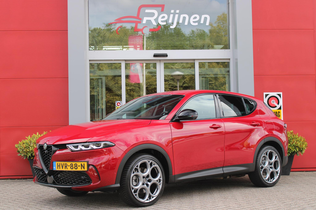 Alfa Romeo Tonale 1.3T PHEV 280PK EDIZIONE BUSINESS | AFNEEMBARE TREKHAAK | ALL SEASON BANDEN | PREMIUM PACK: LEDEREN BEKLEDING/GEVENTILEERDE VOORSTOELEN/4-VOUDIG ELEKTRISCH VERSTELBARE LENDESTEUN VOORSTOELEN/HOOGGLANS ZWARTE RAAMOMLIJSTING/AMBIENT LIGHTING | TECHNOLOGY PACK: PAARKEERWAARSCHUWING VOOR ACHTER ZIJKANT/AUTOMATISCHE INPARKEERHULP MET EXIT ASSIST/360° CAMERA/AUTONOMOUS DRIVING LEVEL 2 MET O.A. ADAPTIVE CRUISE CONTROL/BLIND SPOT DETECTION/AUTOMATISCH DIMMENDE BUITENSPIEGELS/ELEKTRISCH BEDIENBARE ACHTERKLEP/DRAADLOZE TELEFOONLADER | WINTERPACK: STOELVERWARMING VOOR/STUURVERWAR