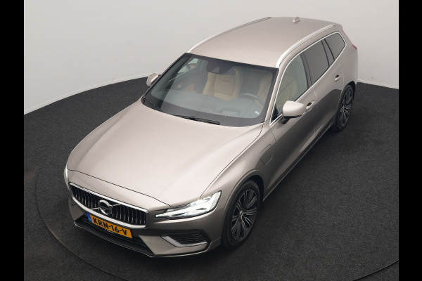 Volvo V60 T6 Recharge AWD Inscription PHEV 340pk Dealer O.H | Trekhaak Af Fabriek | Adaptive Cruise | 360 Camera | Head Up | Lederen Sportstoelen Memory & Verkoeling | Keyless | Apple Carplay | Stoel & Stuurverwarming | Virtual | Navigatie | DAB | 18"L.M | Plug In Hybrid |