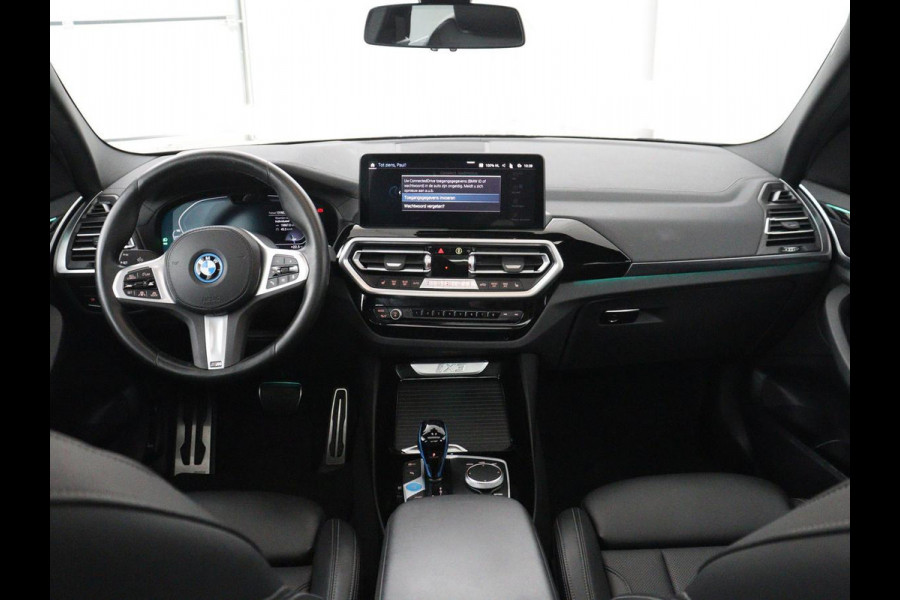 BMW iX3 Executive 80 kWh | SOH 93,8% | Panoramadak | Leder | Stoelverwarming | Adaptive cruise | Carplay | Sfeerverlichting | Camera | Park assist | Elektrische achterklep | PHEV